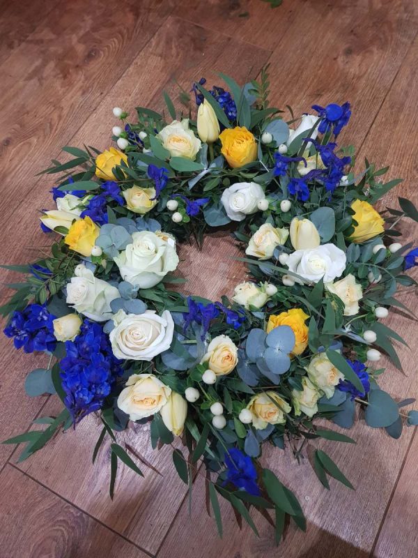 Wreath mixed seasonal flowers and foliage