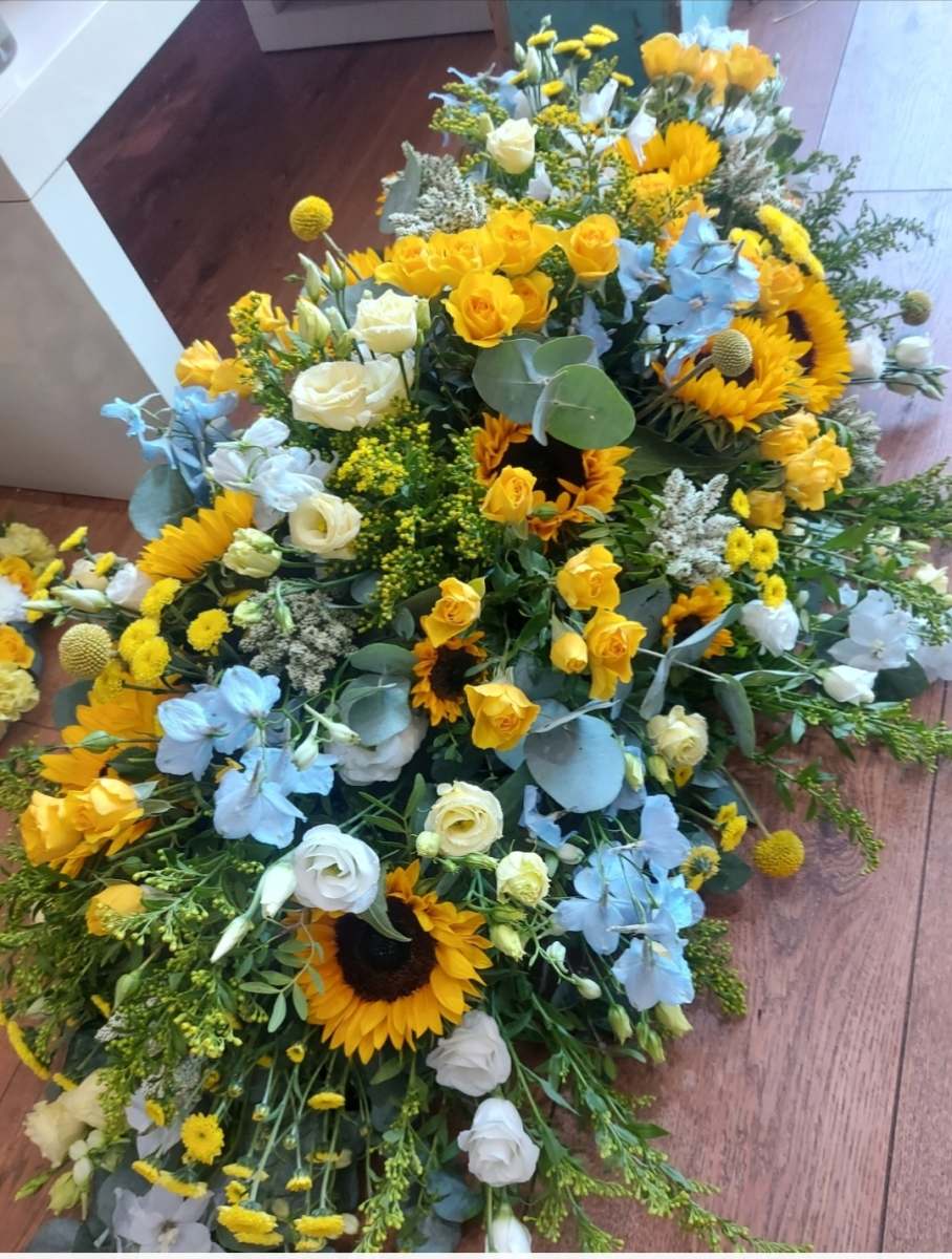 Coffin spray Sunflower and Delphinium